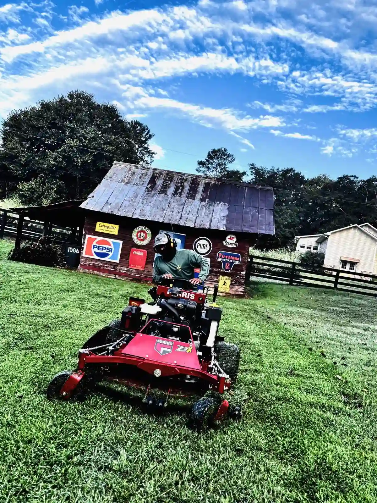 Commercial lawn mowing by Vida Solutions crew on Ferris commercial mower, Cherokee County, GA