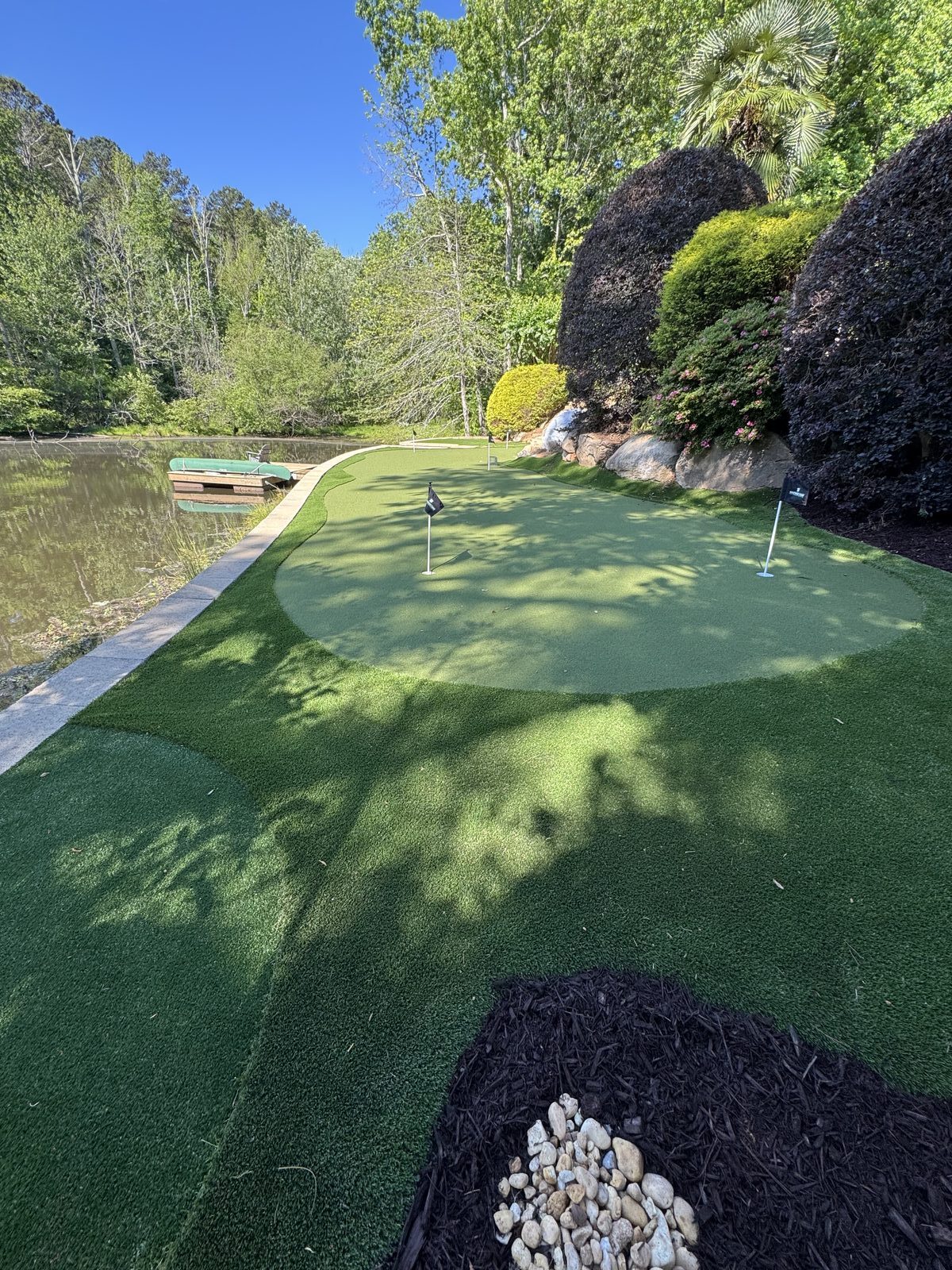 Lake property putting green in Cumming, GA