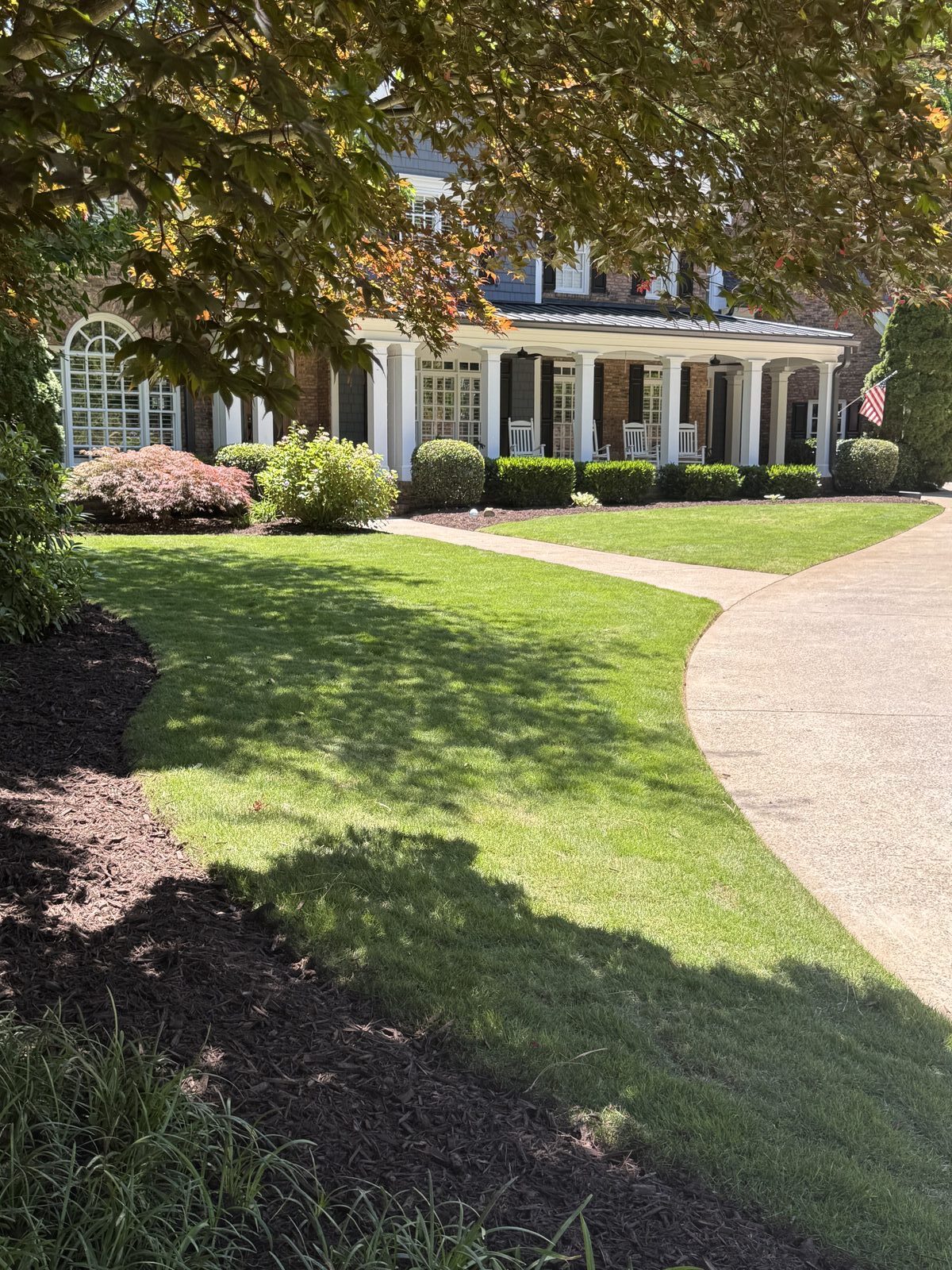 Luxury estate with columned porch in Roswell, GA