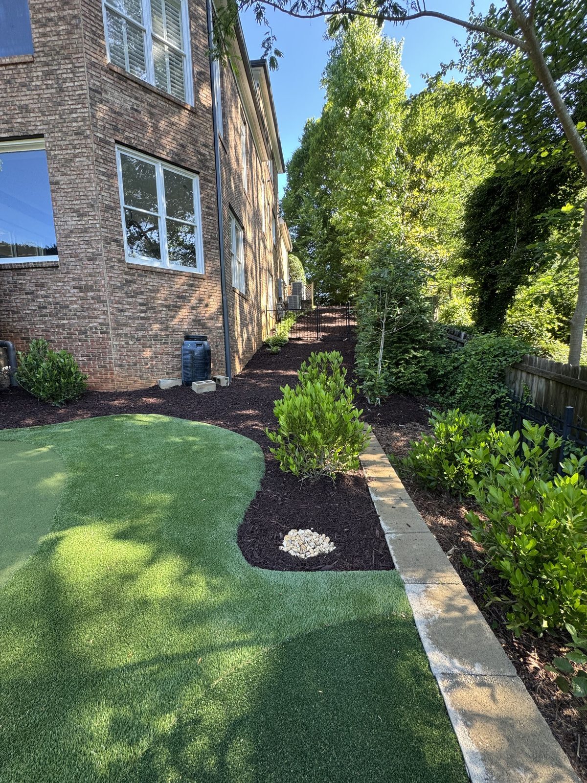 Putting green at a brick home in Alpharetta, GA