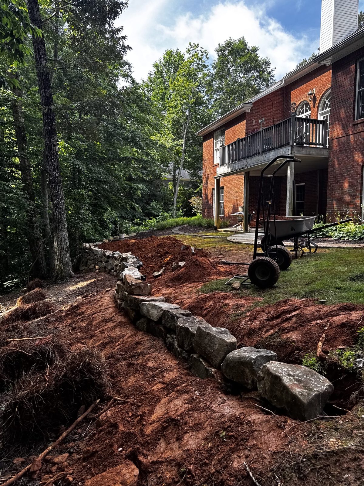 Stone retaining wall construction in Canton